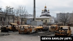 Последствия ракетного обстрела российскими гибридными силами микрорайона «Восточный» Мариуполя, совершенного 24 января 2015 года. Тогда 29 человек погибли и 92 были ранены