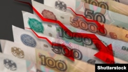 GENERIC – Red arrows pointing down on the background of russian money